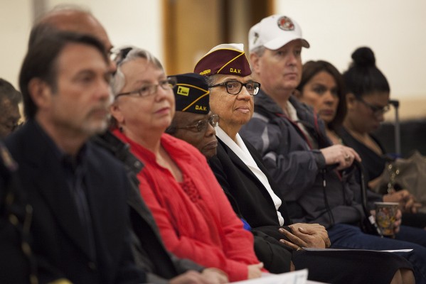 Richmond officials and military veterans listen a Veterans Day speech delivered by Rhonda Harris (photo by Mark Andrew Boyer)